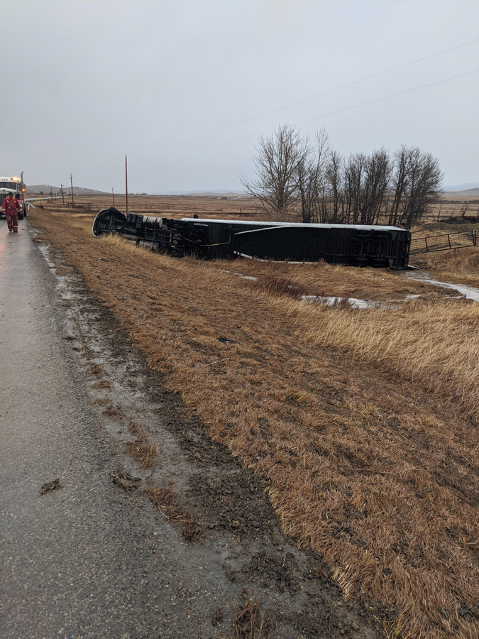 Big Rig Towing Wind Blown Roll Over